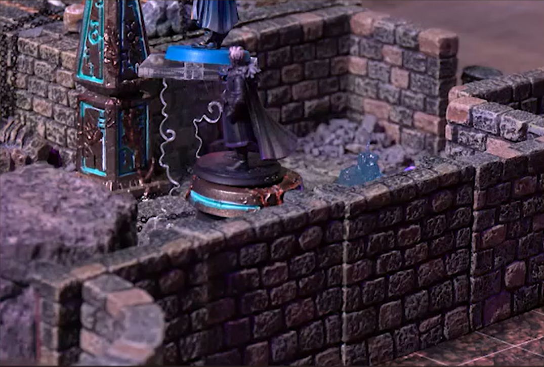 A closeup of an indoor battlemap with stone brick walls where Essek Thelyss stands next to a floating Dorian.